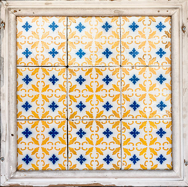 istock Old wall tiles azulejos into wooden frame. 471789022