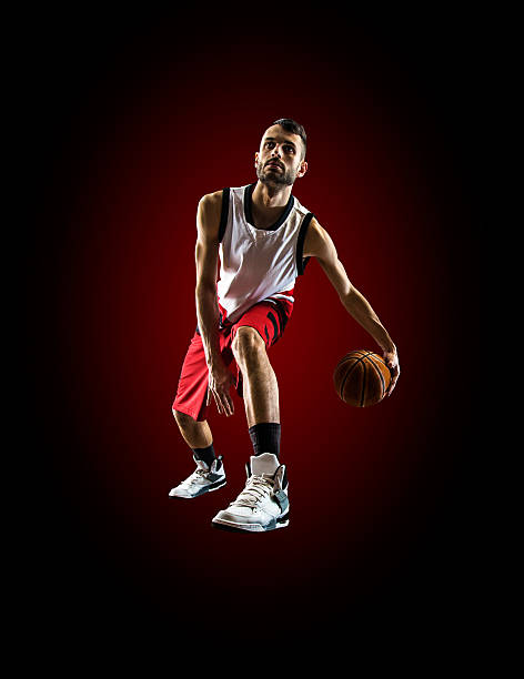 istock Basketball player in action is flying high 471789936