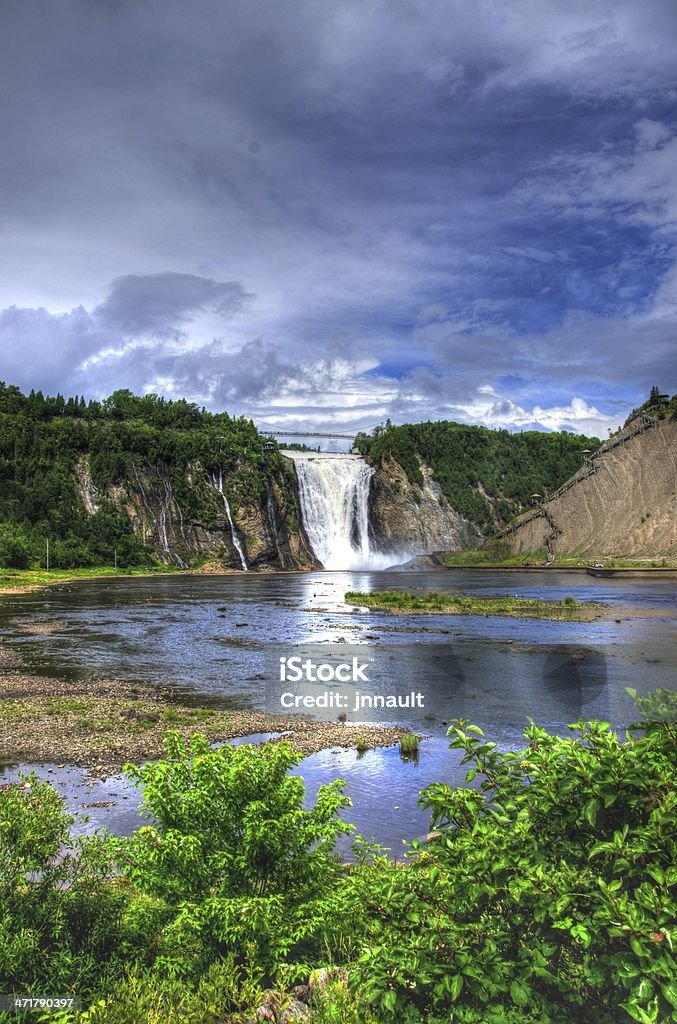 HDR, Montmorency Falls, Quebec City, Canada, Waterfall The Parc de la Chute-Montmorency is located just minutes from Quebec City. Between river and cliffs, is one of the most spectacular sites in the Quebec province.  Montmorency Falls Stock Photo