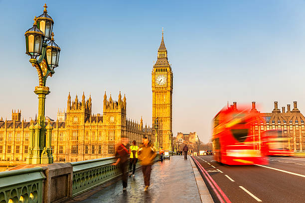 istock Looking at Big Ben as a double decker bus crosses bridge 471791682
