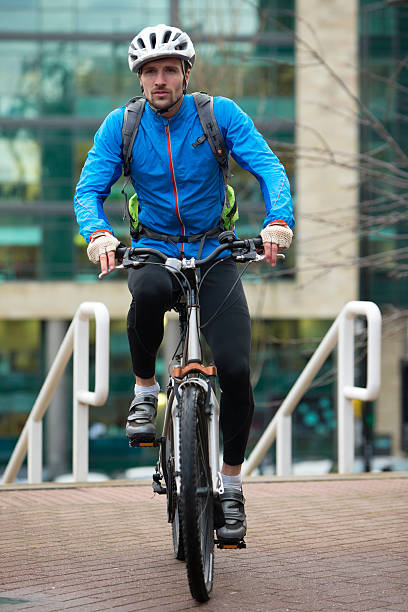 istock Man Riding Bike 471792261