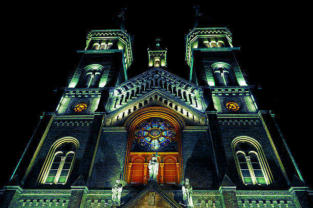 Various night lighting of the Roman-Catholic Cathedral Millenium located in Traian Square, Timisoara, Romania.