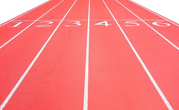 istock Athletic running track lanes at start line 471792650