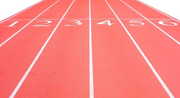 istock Athletic running track lanes at start line 471792654