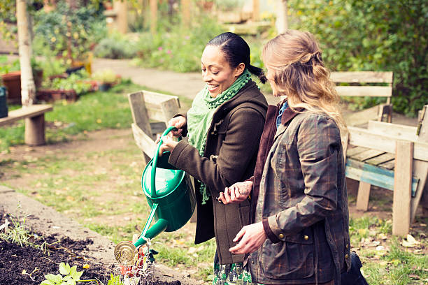 istock Active Friends in Community Garden London England 471794609