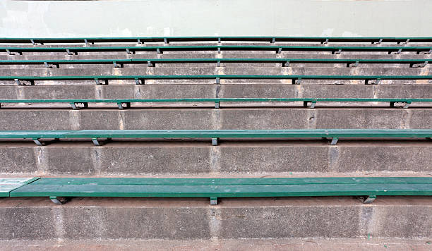 Bleachers Wood bleachers on cement. Horizontal. wooden bleachers stock pictures, royalty-free photos & images