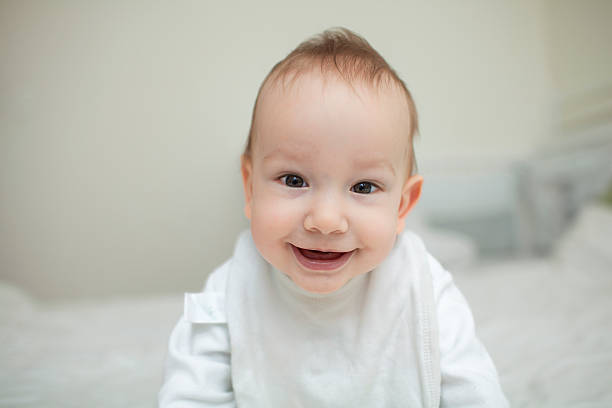 istock Just beautiful. Cute smiling baby 471798960