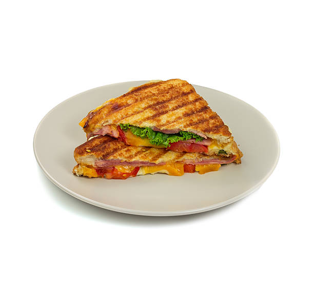 istock Grilled panini sandwiches on plate. Isolated. 471800533