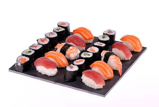 istock plate of sushi on white background 471800831