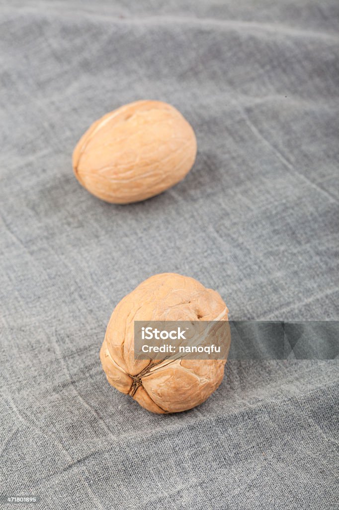 walnut walnuts on burlap cloth Brown Stock Photo