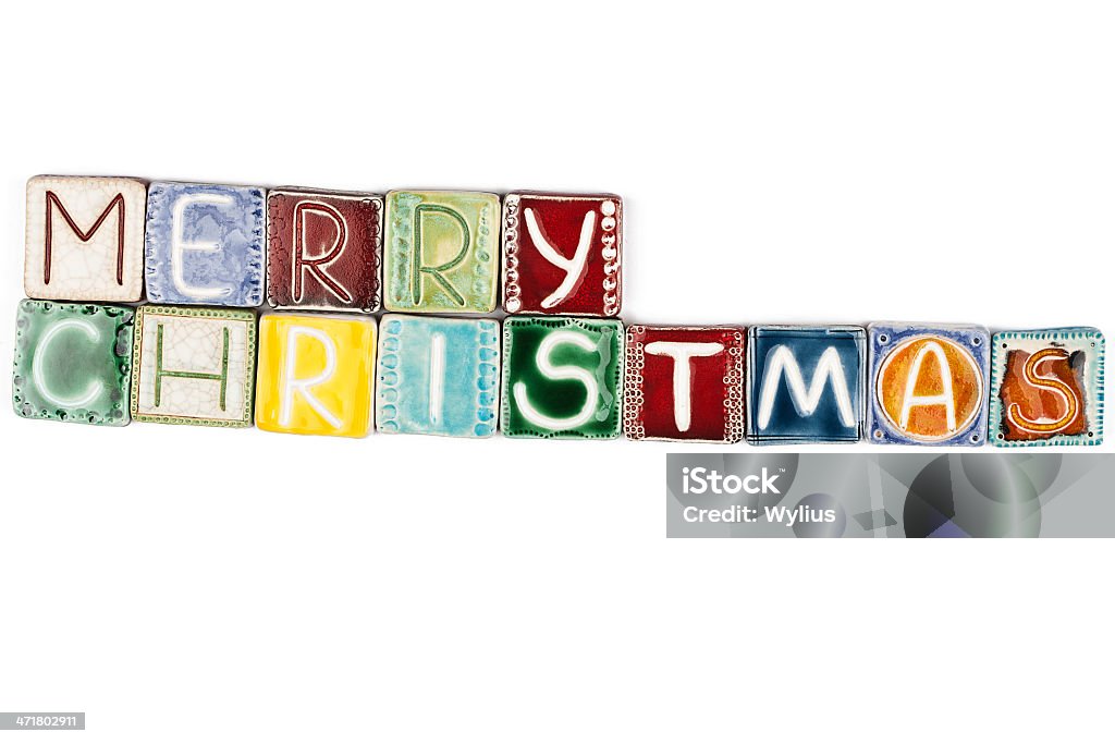 Words "merry christmas" Words "merry christmas" made from ceramic letters isolated on white Alphabet Stock Photo