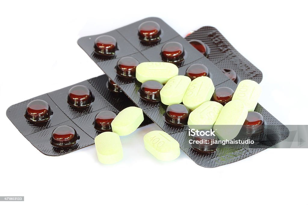 Remédios medicinais e cápsulas embalados em bolhas - Foto de stock de Analgésico royalty-free