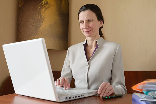 istock Elegant Woman with Laptop 471803162