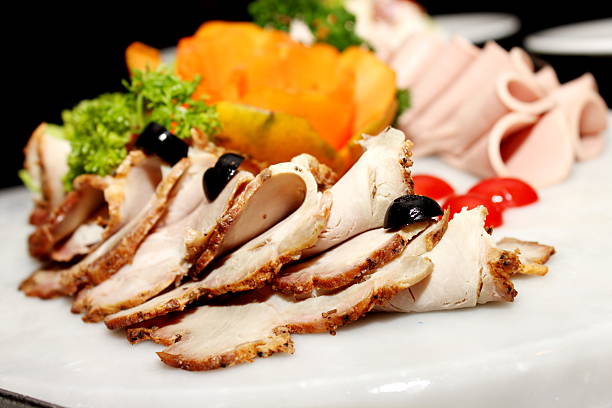 istock Cold cuts meat on banquet table in buffet 471804373