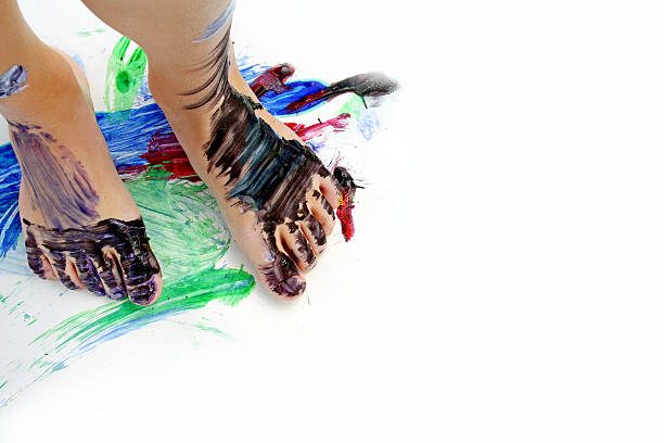 istock Painted Child's Feet on Paper 471804679