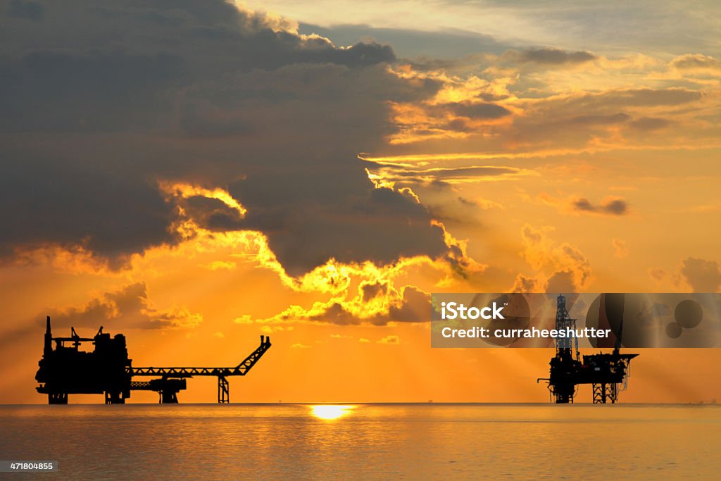 Rig and Platform Rig and platform in sunset or sunrise time. Brazil Stock Photo