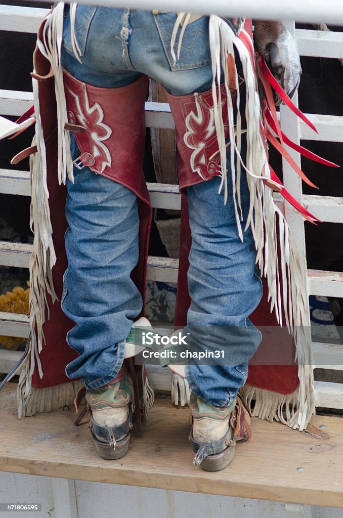 Cowboy im Chaps, Stiefel und Spurs - Lizenzfrei Arbeiten Stock-Foto