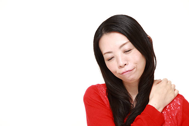 istock Japanese woman suffers from neck ache 471808500