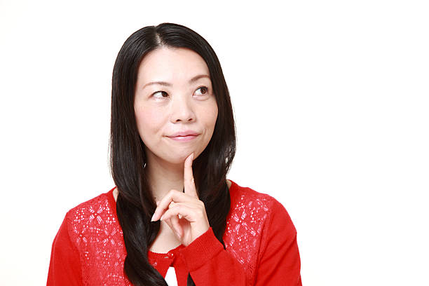 istock Japanese woman thinks about something 471809468