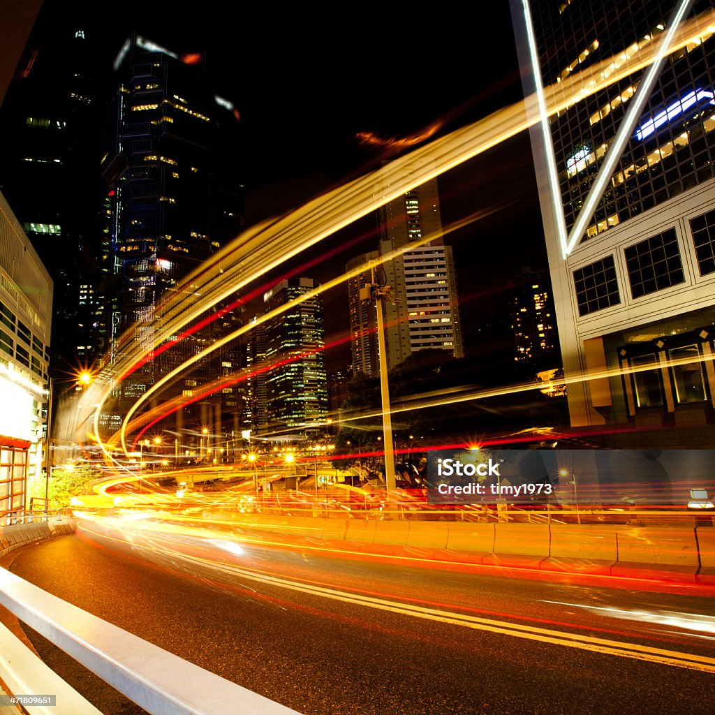 light trails on the modern building background ight trails on the modern building backgroundlight trails on the modern building background Activity Stock Photo