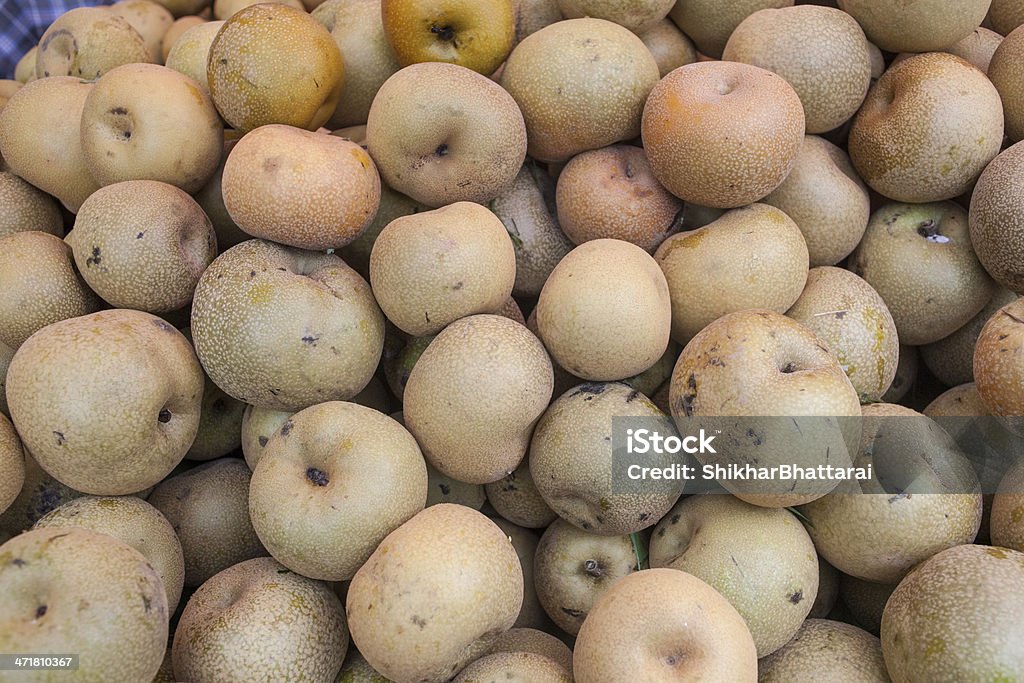 Asian Pere in un mercato. - Foto stock royalty-free di Abbondanza