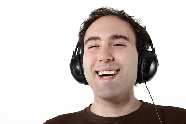 istock Young man enjoying the music 471810397