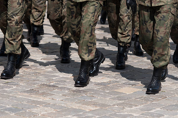 istock Soldiers march in formation 471811401