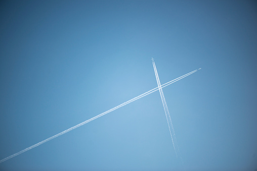 Two aircraft contrail  form a cross