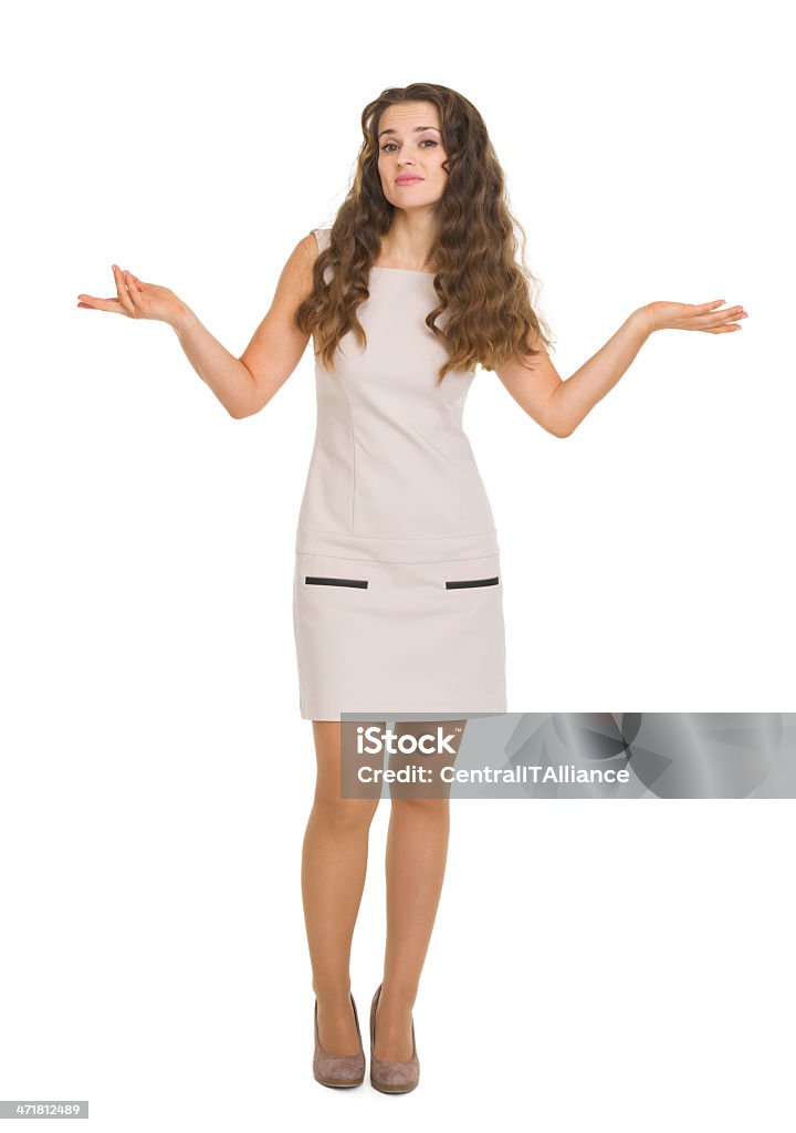 Retrato de corpo inteiro de mulher jovem shrugs clueless - Royalty-free Adulto Foto de stock