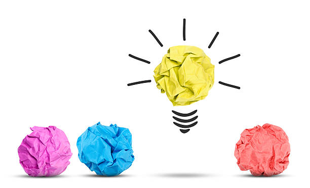 istock A yellow light bulb idea scrunched up paper concept 471812694