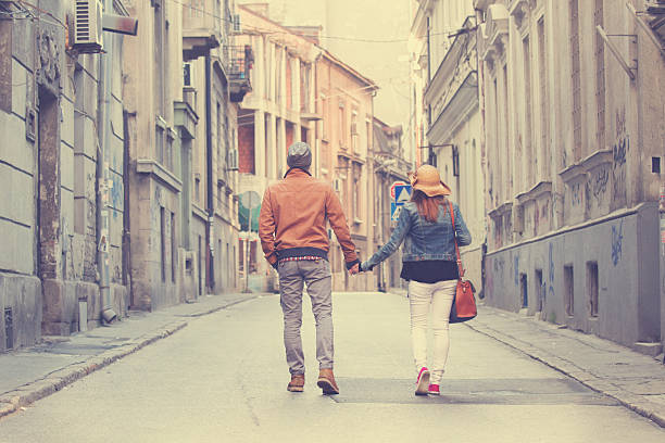 istock Couple enjoying outdoors in a urban surroundings. 471813428