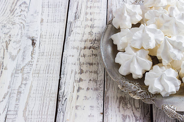 istock White meringue on plate served in elegant style. 471813776