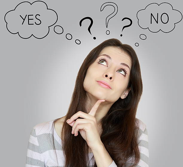 istock Thinking young woman with yes or no choice 471814805