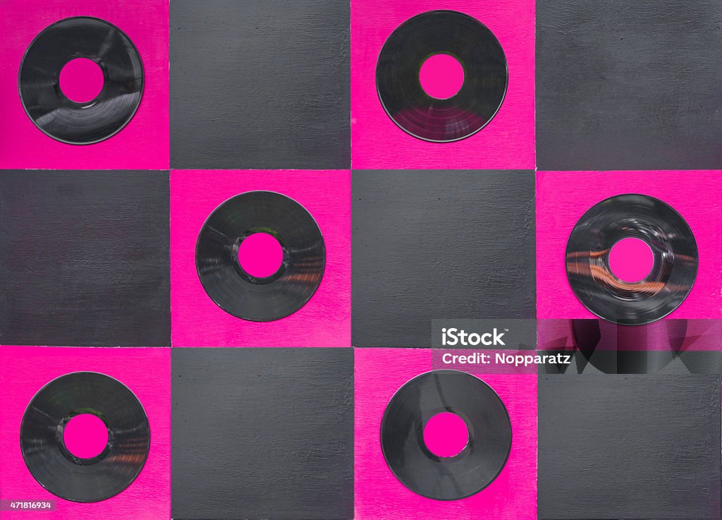 pink and black color paint with center gramophone record pink and black color paint with center gramophone record on square wood . 2015 Stock Photo