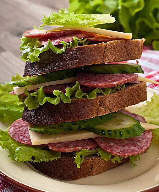 istock sandwich with cheese and meat sausages 471817040