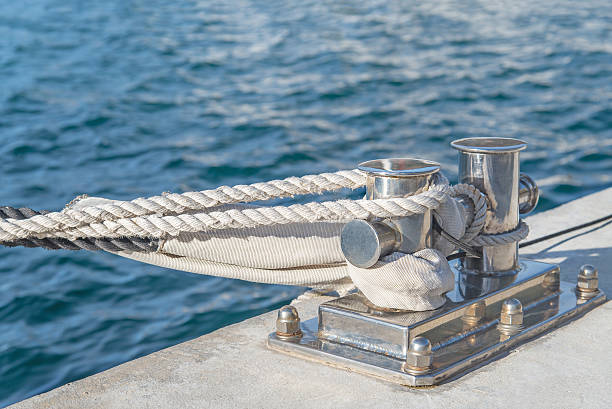 istock Marina bollard (bitt) at jetty for mooring with rope 471817140