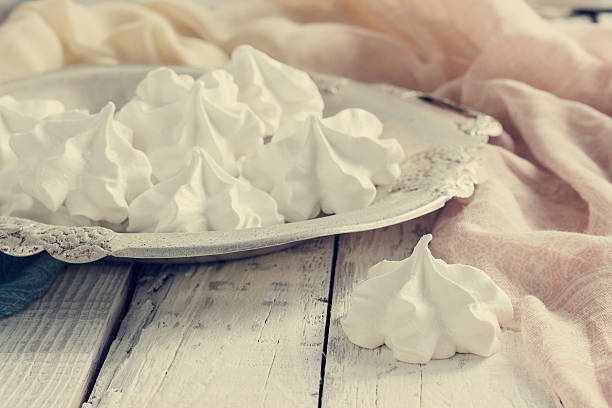 istock White meringue on plate served in elegant style. 471818220