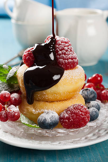 istock Morning breakfast with mini donuts and berries 471818670