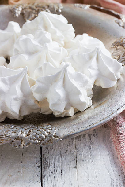 istock White meringue on plate served in elegant style. 471818834