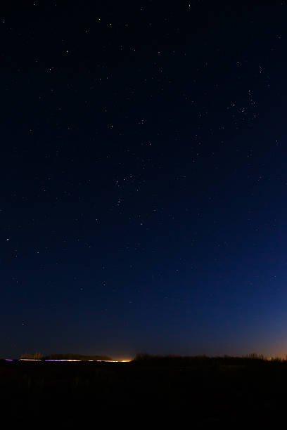 istock Road bridge in the night the starry sky. 471819680