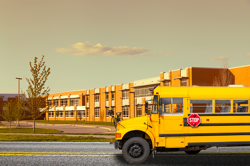 School bus in front of a school