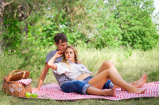 istock Young couple on picnic 471822359