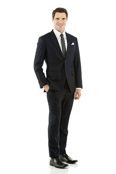 istock Handsome young businessman with hands in pocket 471822361
