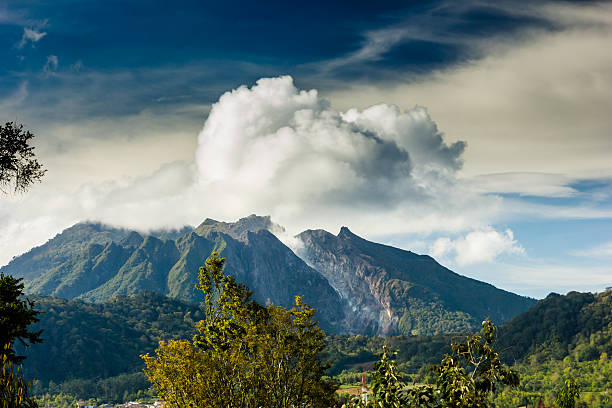 istock Volcano producing clouds of gas and steam 471822623