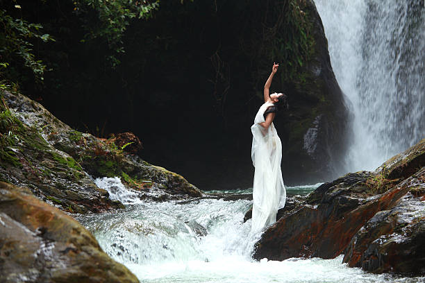 istock Young woman practicing yoga 471823389