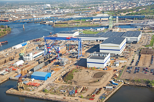 Aerial view of shipyard and navy ships.  RM