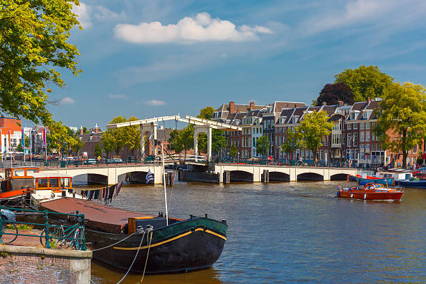 istock Amstel and bridge Magere Brug, Amsterdam, Holland 471824332