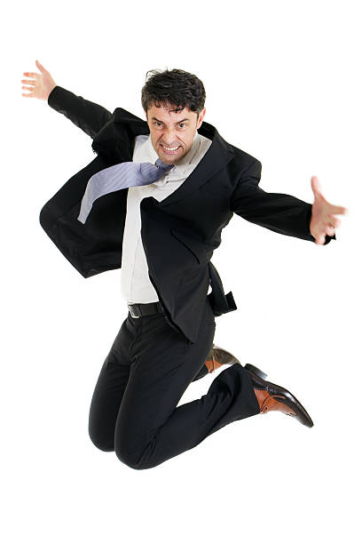 istock Agile businessman leaping in the air 471825019