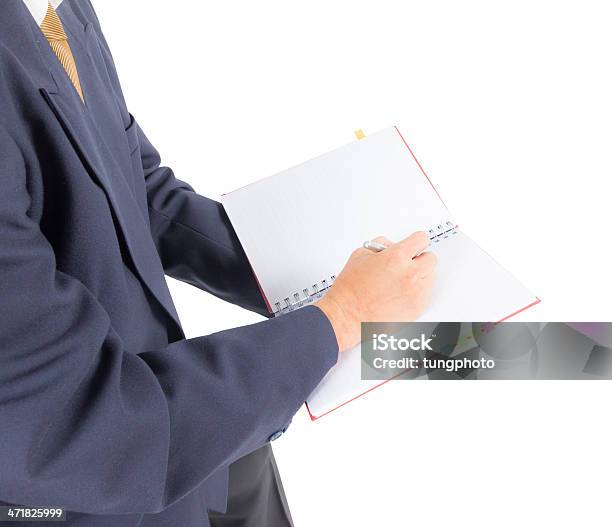 Business Man Writing On Notebook Stock Photo - Download Image Now - Adult, Analyzing, Business