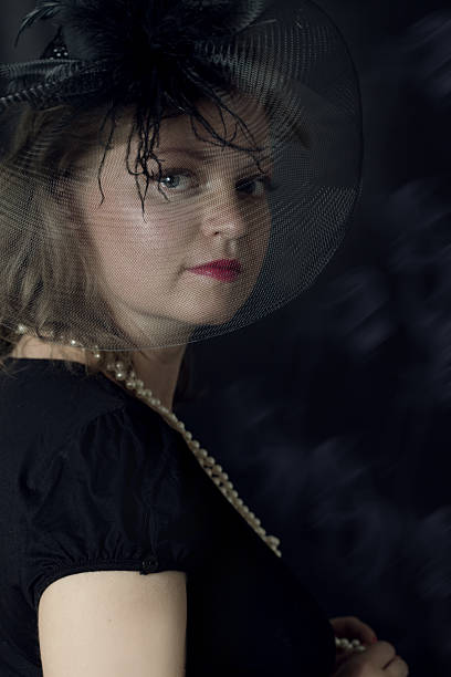 istock Elegant retro woman in veil 471826383